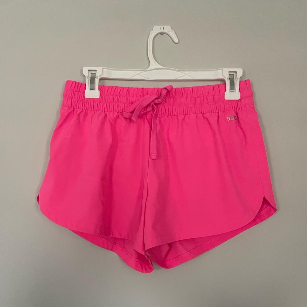 DSG hot pink athletic shorts with built in underwear. Size Small